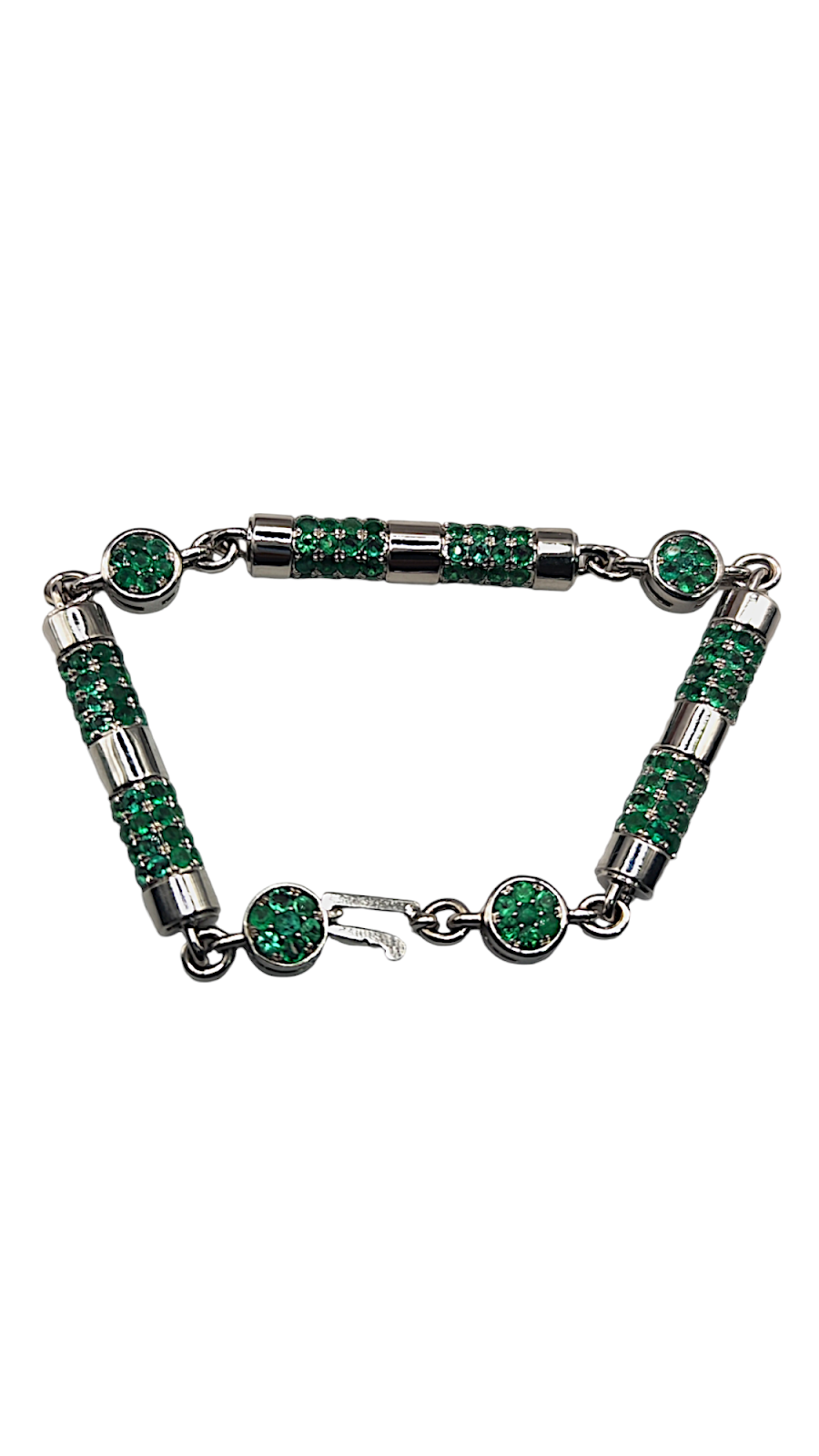 *Historia de la creación de una pulsera única: El arte detrás de las esmeraldas en oro blanco*