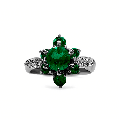 Anillo Flor en Esmeralda en Oro Blanco 18k