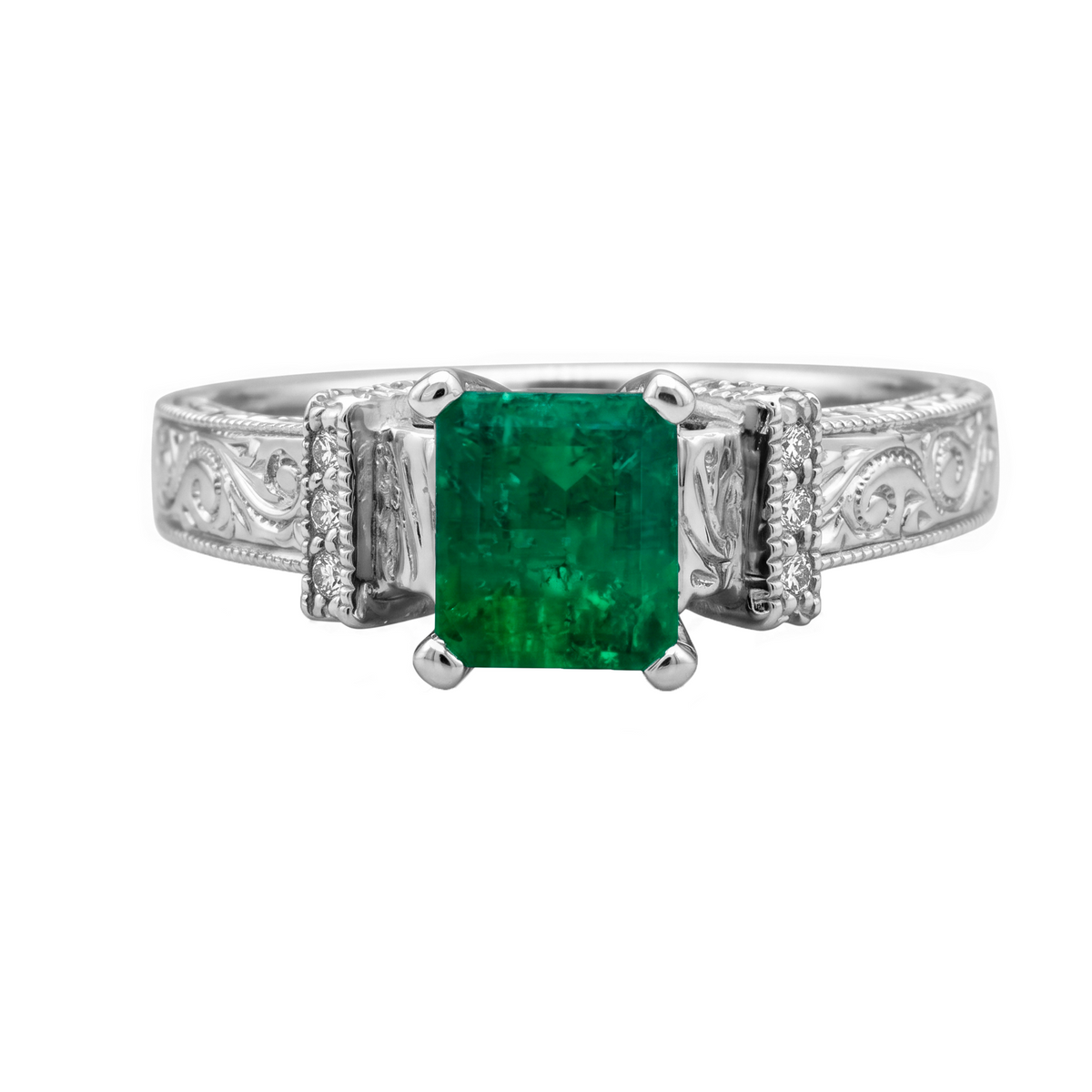 Anillo Labrado y Adorno con Uñas en Esmeralda y Diamante en Oro Blanco 18 k